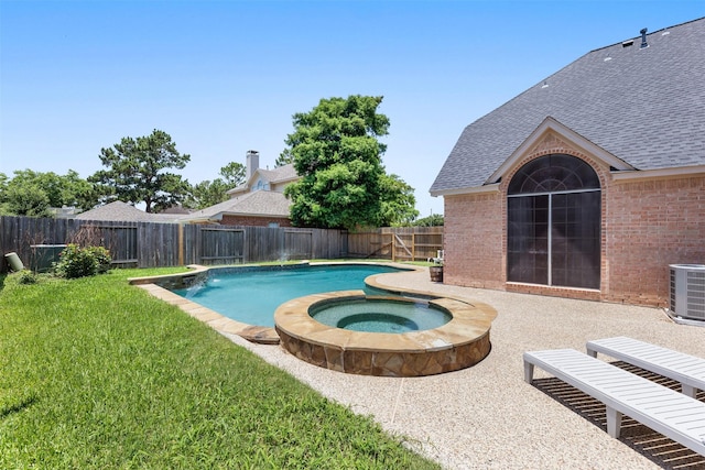 20731 Maple Village Dr, Cypress, TX 77433 - view of swimming pool featuring a fenced backyard, a pool with connected hot tub, and a patio area