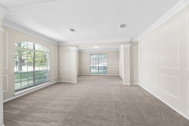 20731 Maple Village Dr, Cypress, TX 77433 - unfurnished room with a decorative wall, crown molding, ornate columns, and carpet floors