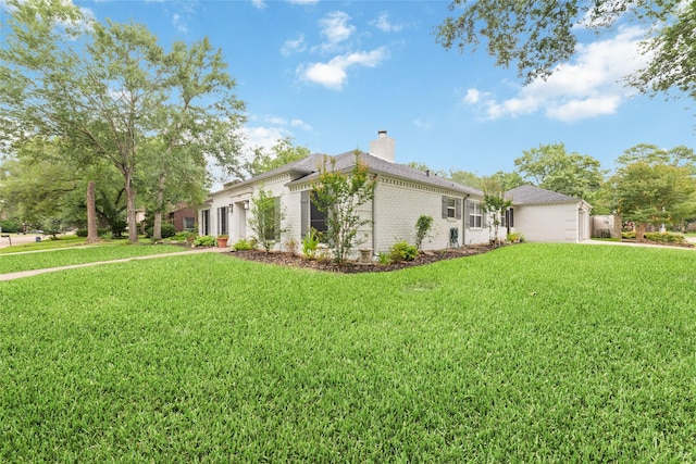 13302 Holston Hills Dr, Houston, TX 77069 - view of property exterior featuring a chimney, brick siding, and a lawn
