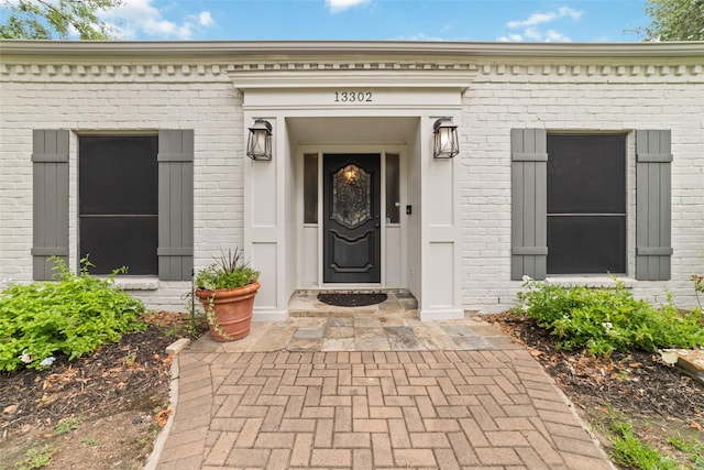 13302 Holston Hills Dr, Houston, TX 77069 - doorway to property with brick siding