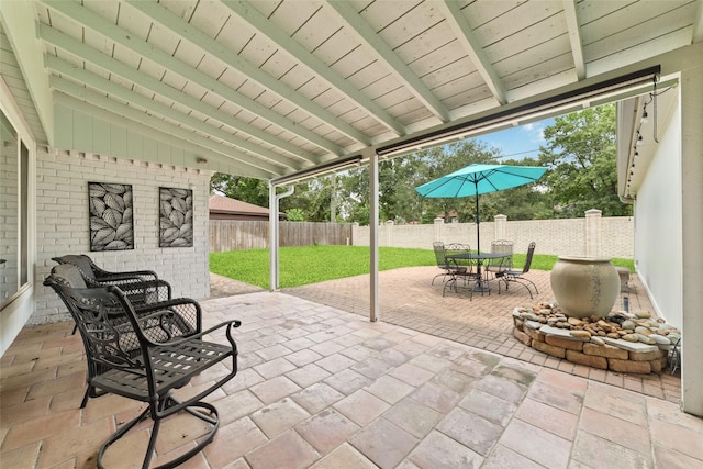 13302 Holston Hills Dr, Houston, TX 77069 - fenced backyard with a patio and outdoor dining area