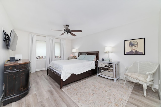 13302 Holston Hills Dr, Houston, TX 77069 - bedroom with light wood-style flooring and a ceiling fan