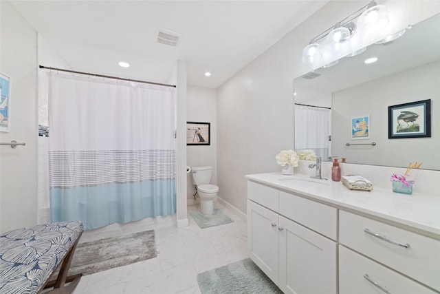 13302 Holston Hills Dr, Houston, TX 77069 - bathroom with vanity, marble finish floors, and recessed lighting