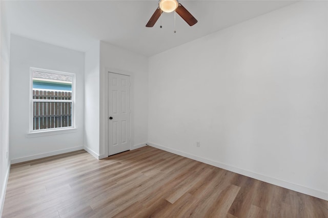 8211 Barlow St, Houston, TX 77028 - empty room with light wood-type flooring and a ceiling fan