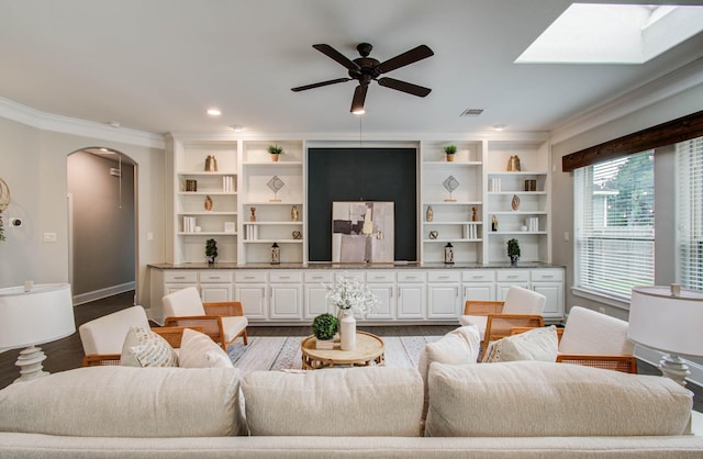 931 Shirkmere Rd, Houston, TX 77008 - living room featuring arched walkways, wood finished floors, a ceiling fan, ornamental molding, and recessed lighting