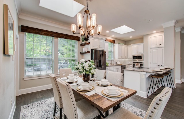 931 Shirkmere Rd, Houston, TX 77008 - dining room featuring a skylight, plenty of natural light, dark wood finished floors, recessed lighting, and crown molding