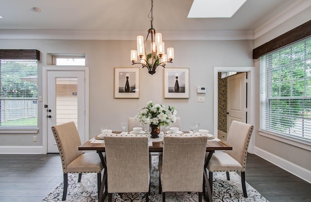 931 Shirkmere Rd, Houston, TX 77008 - dining room with a skylight, a chandelier, ornamental molding, and dark wood finished floors