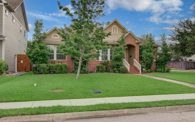 931 Shirkmere Rd, Houston, TX 77008 - obstructed view of property with brick siding and a gate