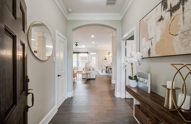 931 Shirkmere Rd, Houston, TX 77008 - entrance foyer with ornamental molding, arched walkways, dark wood-style flooring, ceiling fan, and recessed lighting