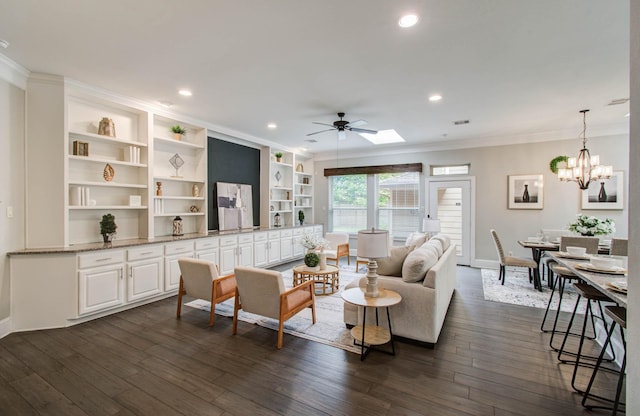 931 Shirkmere Rd, Houston, TX 77008 - living room with ornamental molding, a ceiling fan, dark wood-style floors, recessed lighting, and a chandelier