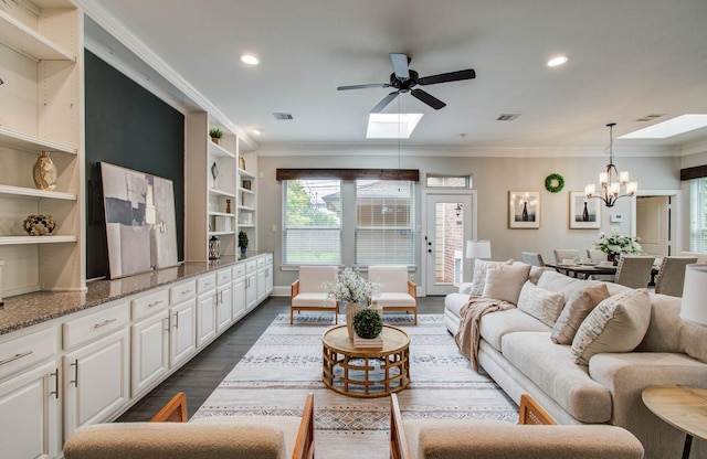 931 Shirkmere Rd, Houston, TX 77008 - living area with ceiling fan, dark wood-style flooring, crown molding, recessed lighting, and a chandelier