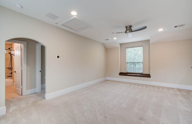 931 Shirkmere Rd, Houston, TX 77008 - empty room featuring light carpet, a ceiling fan, arched walkways, recessed lighting, and attic access