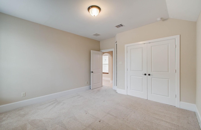 931 Shirkmere Rd, Houston, TX 77008 - unfurnished bedroom featuring carpet floors, a closet, and lofted ceiling