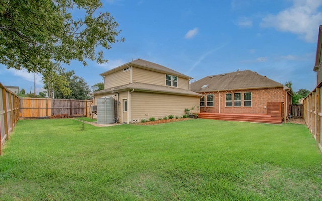 931 Shirkmere Rd, Houston, TX 77008 - back of property with a fenced backyard, an attached garage, and a wooden deck
