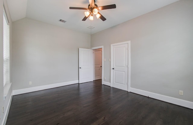 931 Shirkmere Rd, Houston, TX 77008 - unfurnished bedroom with dark wood finished floors, lofted ceiling, and ceiling fan