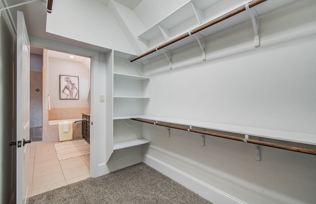 931 Shirkmere Rd, Houston, TX 77008 - walk in closet featuring light tile patterned floors