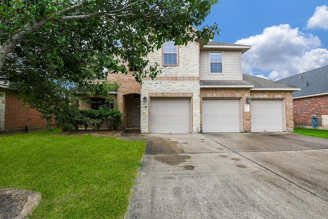 6533 Gray Birch Ln, Dickinson, TX 77539 - view of front facade with concrete driveway, a front yard, a garage, and a shingled roof