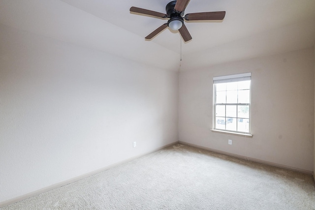 6533 Gray Birch Ln, Dickinson, TX 77539 - empty room featuring light carpet, ceiling fan, and vaulted ceiling