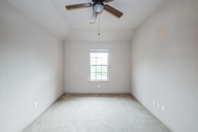 6533 Gray Birch Ln, Dickinson, TX 77539 - spare room with carpet floors, ceiling fan, and vaulted ceiling