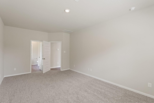 103 Black Bear Dr, Huntsville, TX 77320 - empty room featuring carpet flooring and baseboards