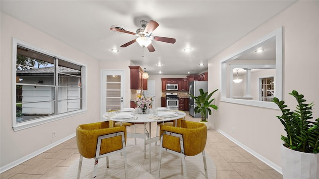 9643 Val Verde St, Houston, TX 77063 - dining space featuring a ceiling fan, light tile patterned flooring, and recessed lighting