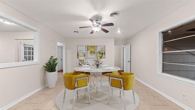 9643 Val Verde St, Houston, TX 77063 - tiled dining space with ceiling fan and recessed lighting