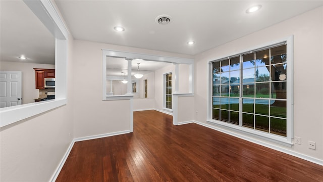 9643 Val Verde St, Houston, TX 77063 - unfurnished room featuring wood finished floors and recessed lighting