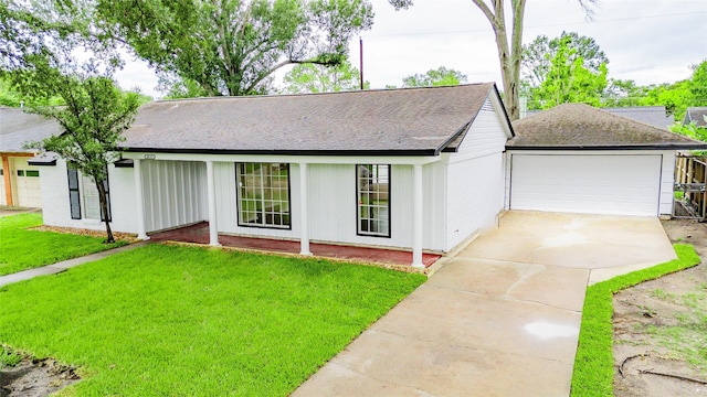 9643 Val Verde St, Houston, TX 77063 - view of front of house with a front yard, roof with shingles, and driveway