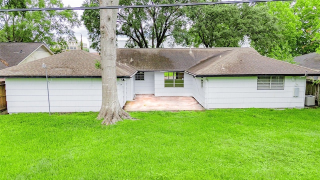 9643 Val Verde St, Houston, TX 77063 - back of house with roof with shingles and a patio area