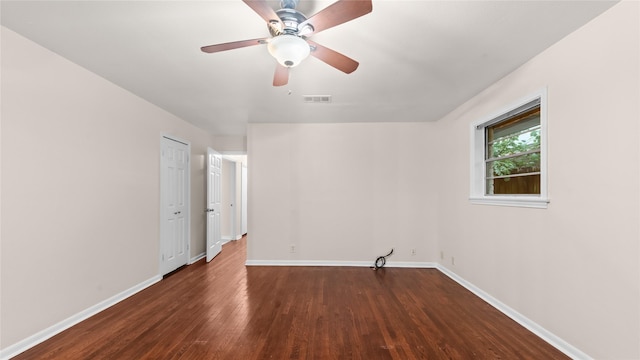 9643 Val Verde St, Houston, TX 77063 - spare room with dark wood finished floors and ceiling fan
