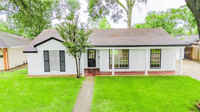 9643 Val Verde St, Houston, TX 77063 - view of front of property with board and batten siding and a shingled roof