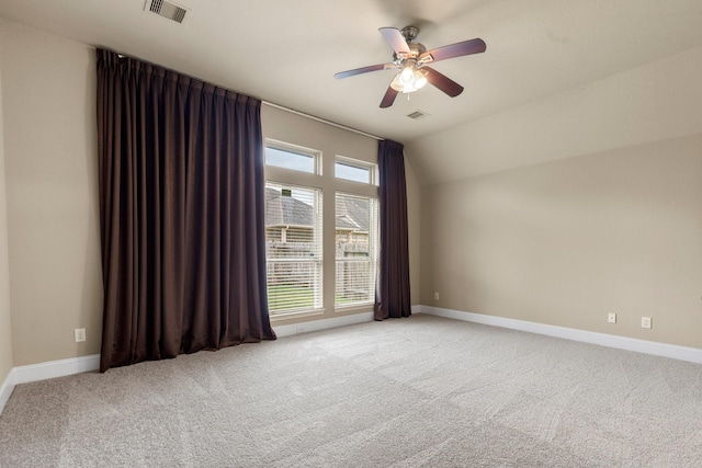 1215 Oxbow Crossing Ln, Rosenberg, TX 77471 - spare room with light carpet, ceiling fan, and lofted ceiling