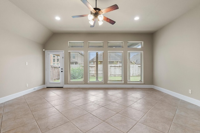 1215 Oxbow Crossing Ln, Rosenberg, TX 77471 - empty room with light tile patterned floors, a ceiling fan, recessed lighting, and vaulted ceiling