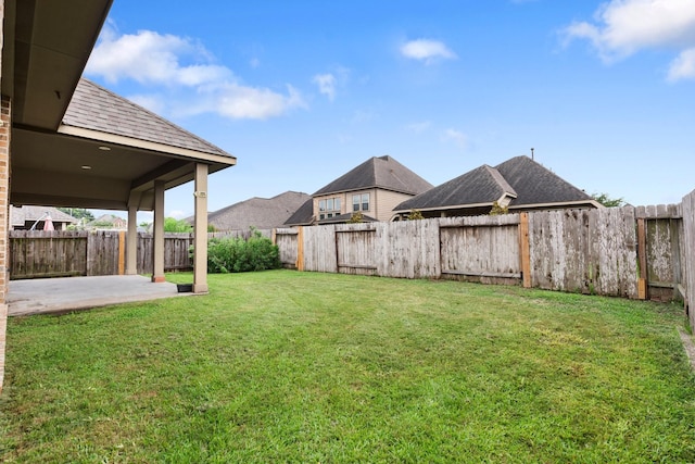 1215 Oxbow Crossing Ln, Rosenberg, TX 77471 - fenced backyard with a patio area