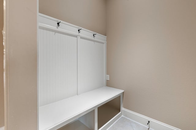 1215 Oxbow Crossing Ln, Rosenberg, TX 77471 - mudroom with baseboards and light tile patterned floors
