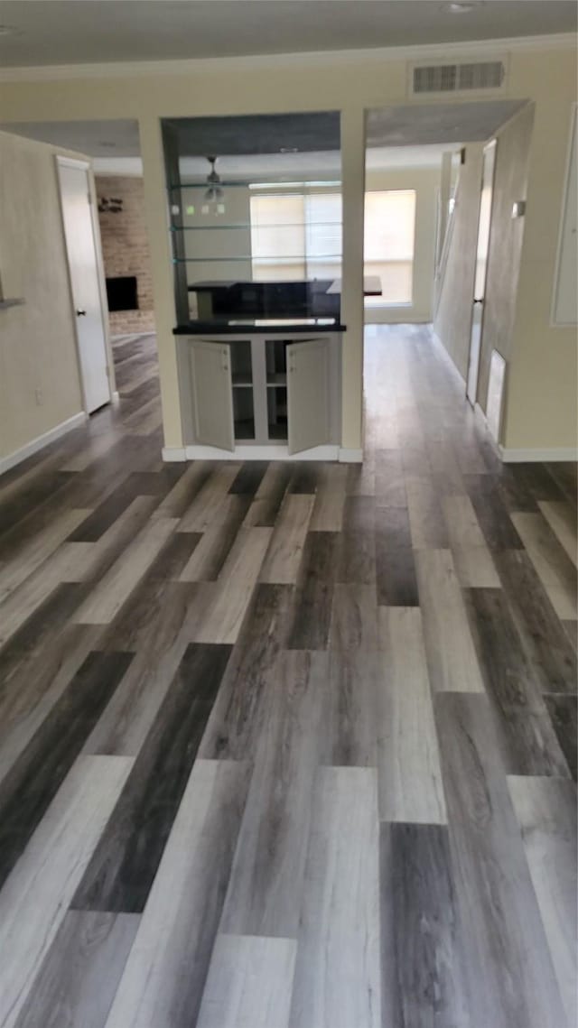 8367 Nairn St, Houston, TX 77074 - hallway with dark wood-style floors and baseboards