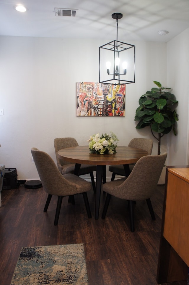 4217 Sterling St, Houston, TX 77051 - dining area featuring wood finished floors, recessed lighting, and a chandelier