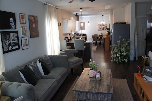 4217 Sterling St, Houston, TX 77051 - living area featuring ceiling fan, dark wood-type flooring, and attic access
