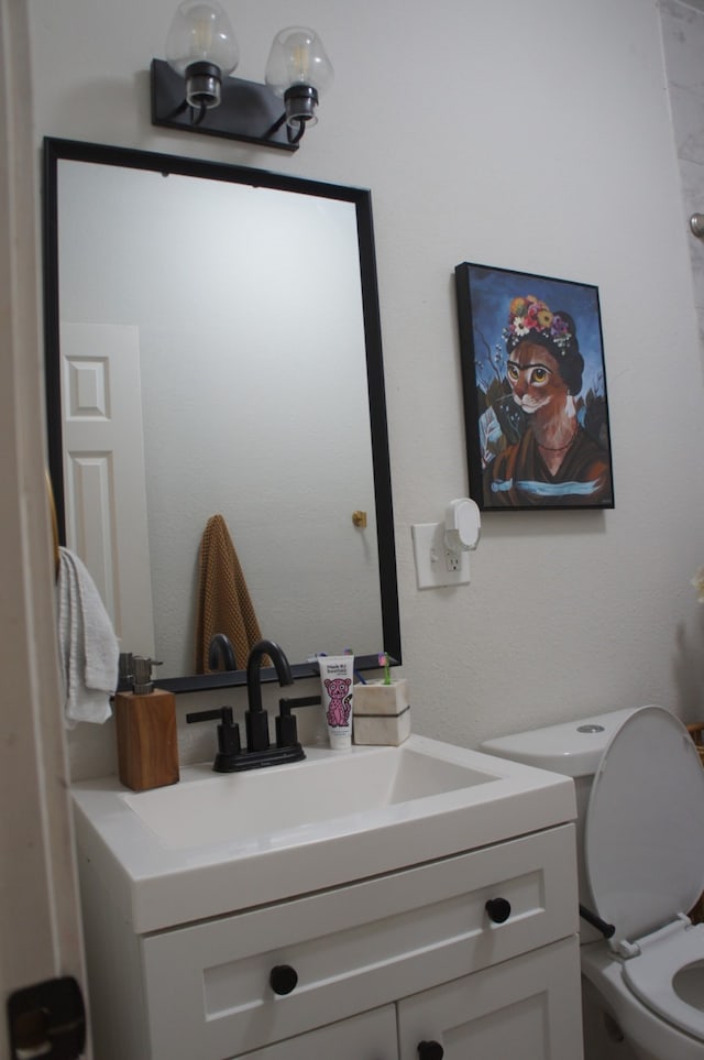 4217 Sterling St, Houston, TX 77051 - half bathroom featuring vanity and toilet