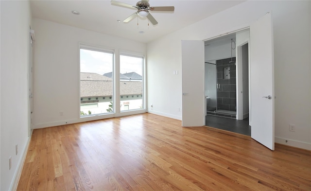 5711 Kansas, Houston, TX 77007 - unfurnished room with ceiling fan and light wood finished floors