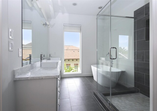 5711 Kansas, Houston, TX 77007 - full bath with vanity, a soaking tub, a shower stall, and tile patterned flooring