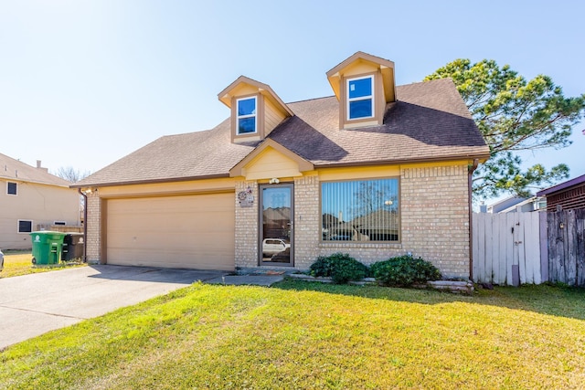 6335 Danshire Ct, Houston, TX 77049 - view of front of property with brick siding, an attached garage, concrete driveway, and a shingled roof