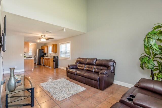 6335 Danshire Ct, Houston, TX 77049 - living room with light tile patterned flooring and a ceiling fan