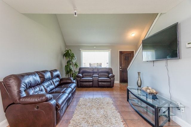 6335 Danshire Ct, Houston, TX 77049 - living area featuring lofted ceiling and tile patterned flooring