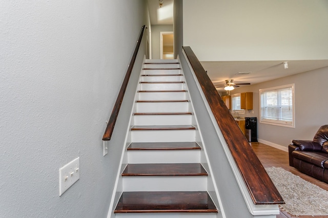 6335 Danshire Ct, Houston, TX 77049 - stairway featuring baseboards and ceiling fan