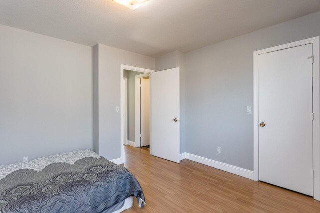 6335 Danshire Ct, Houston, TX 77049 - bedroom featuring light wood-style floors and baseboards