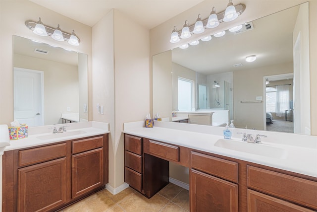 24802 Colonial Maple Dr, Katy, TX 77493 - full bathroom featuring vanity, an enclosed shower, tile patterned floors, and ensuite bathroom