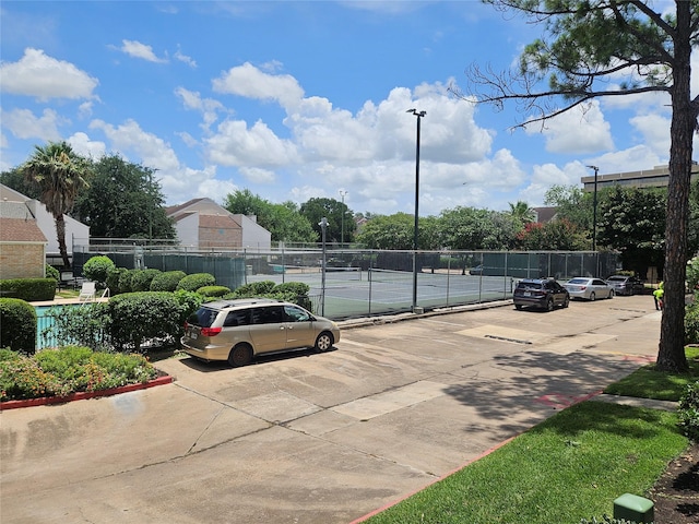 7950 N Stadium Dr Unit 191, Houston, TX 77030 - uncovered parking lot with a tennis court