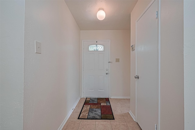 4330 Brookhead Trl, Houston, TX 77066 - entryway featuring baseboards and light tile patterned floors