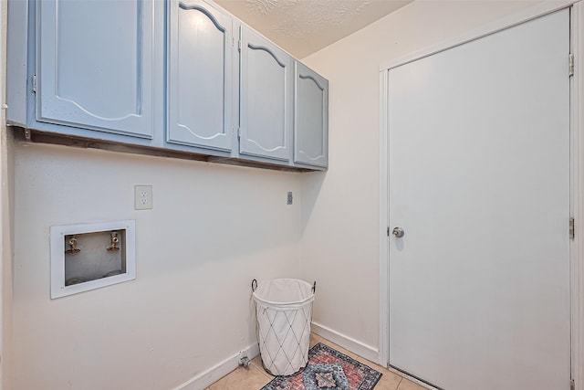 4330 Brookhead Trl, Houston, TX 77066 - washroom with cabinet space, hookup for a washing machine, and light tile patterned floors